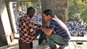 Miguel_praying_with_a_man_during_the_national_mourning_period